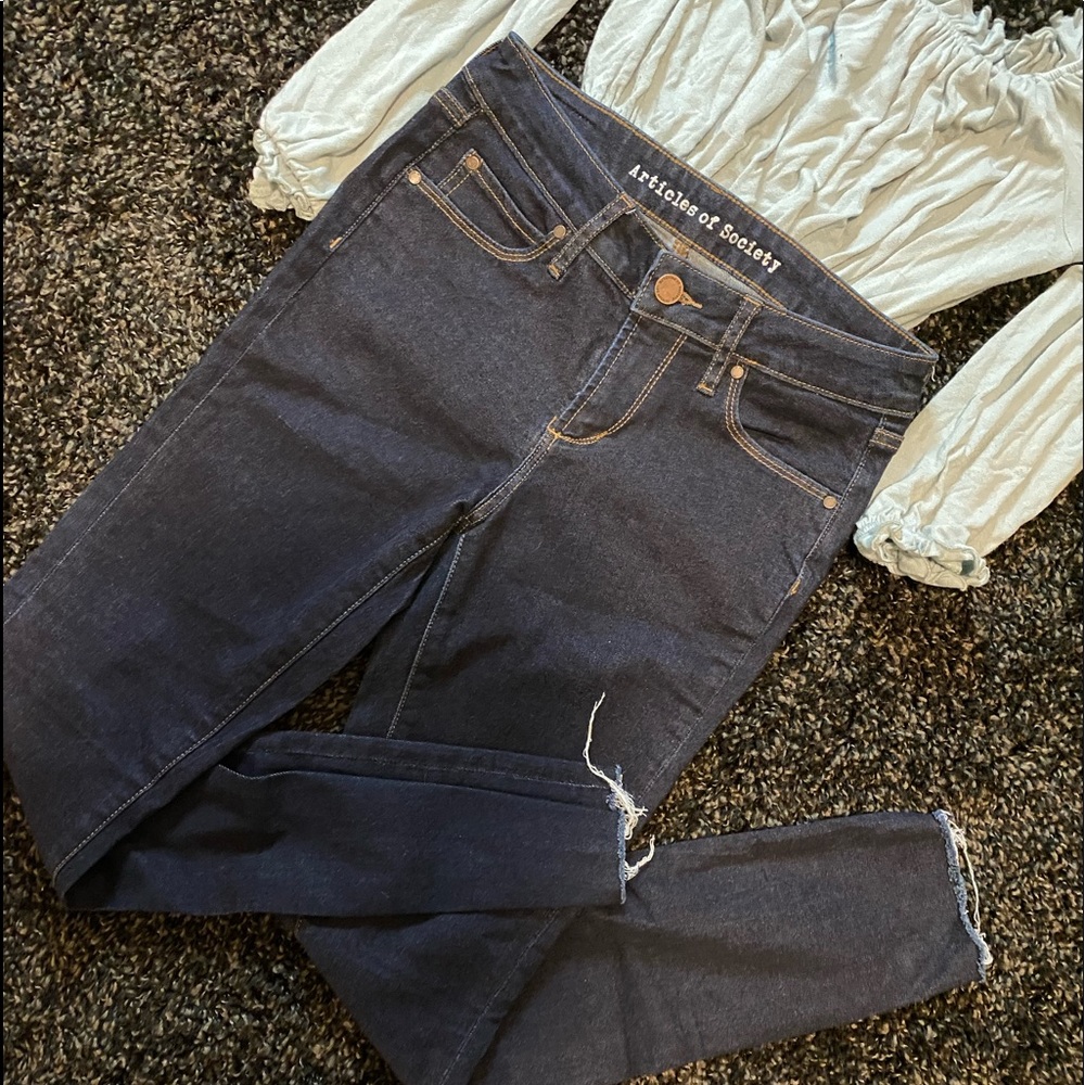 Dark denim jeans.